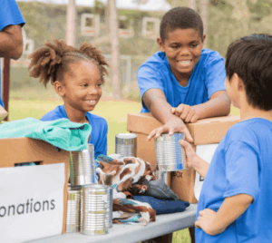Kids donating food for homeless shelter
